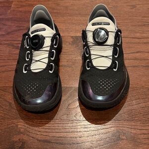 Under Armour Kids Black and White slip speed sneakers
